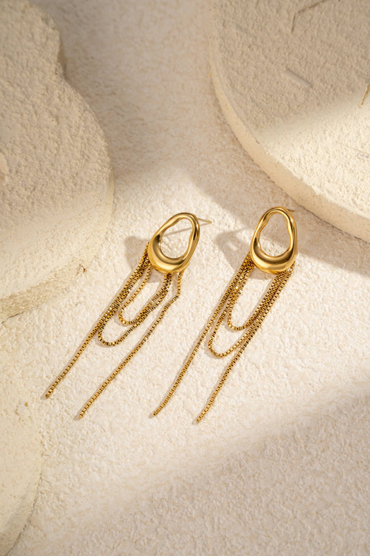 Gouden krullen oorbellen vloeiende hangers roestvrij staal gouden beweging|Beautiva Boutique