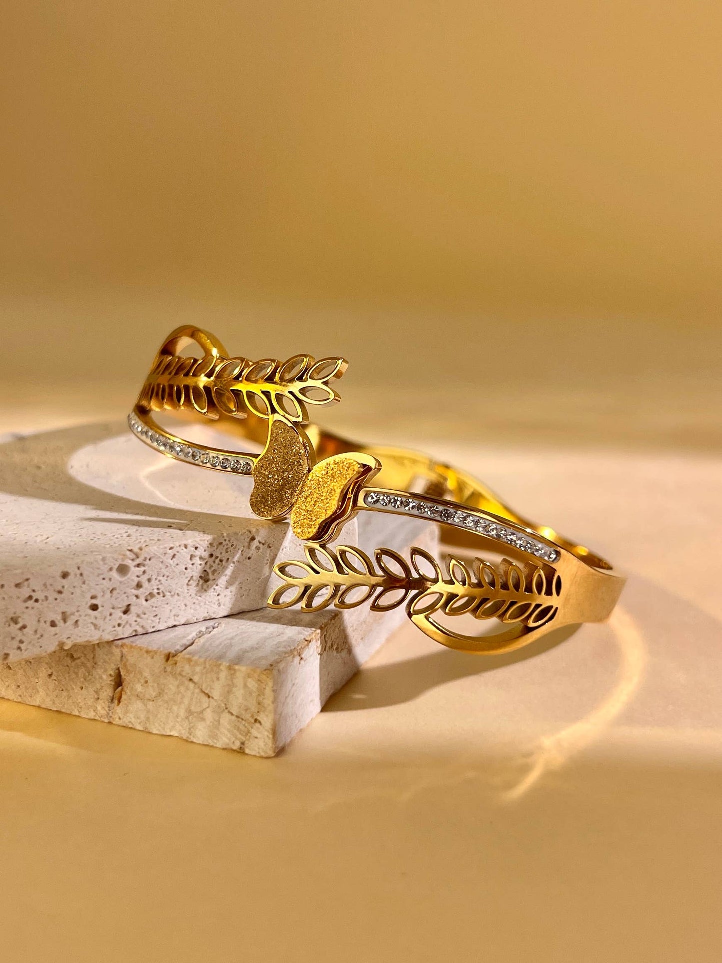 Armband met blad- en vlindermotief van roestvrij staal: Geelgoud|Beautiva Boutique