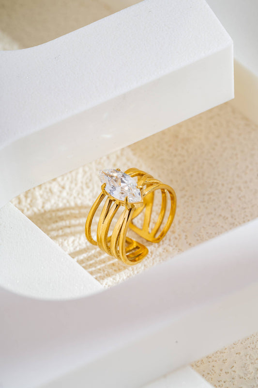 Deze gouden ring van roestvrij staal verleidt met zijn ringen.: Blanc|Beautiva Boutique