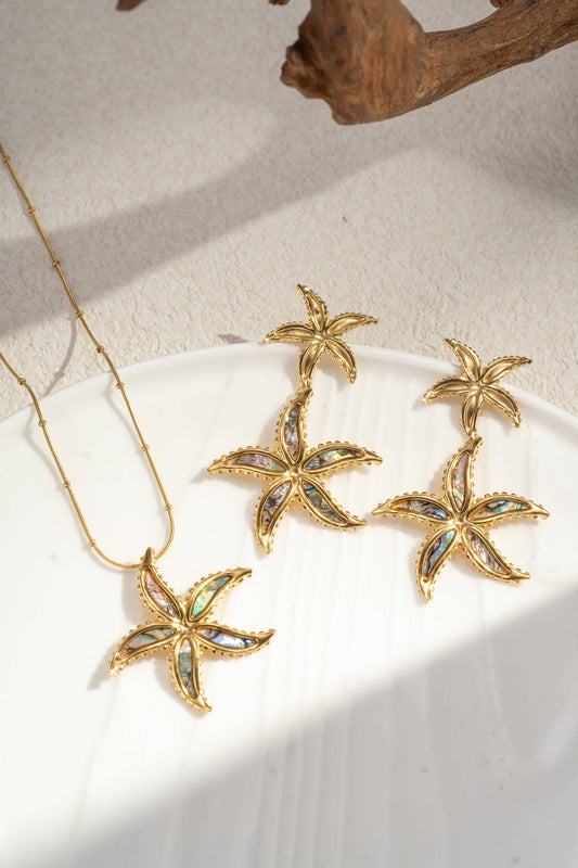 Oorbellen Goud van roestvrij staal met iriserende parelmoer zeester | Beautiva Boutique