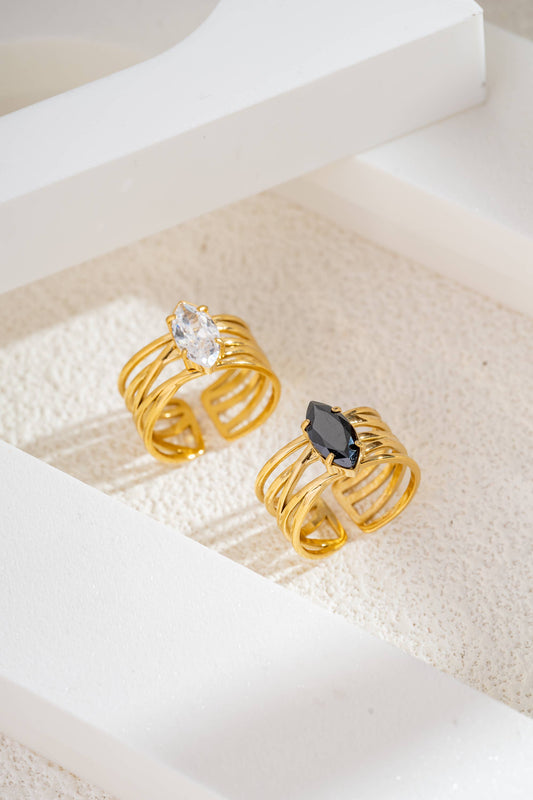 Deze gouden ring van roestvrij staal verleidt met zijn ringen.: Blanc|Beautiva Boutique