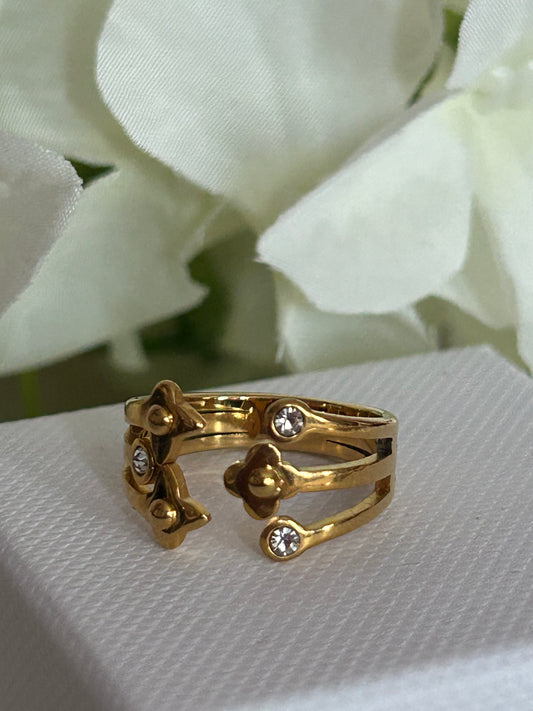 Verstelbare roestvrijstalen Design  ring met ster en fonkelende strass.: Geelgoud|Beautiva Boutique